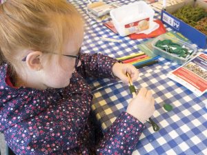 Girl enjoying craft activities