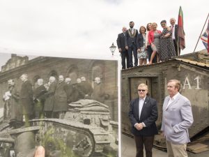 Recreation of photograph featuring people standing on the tank from 1918