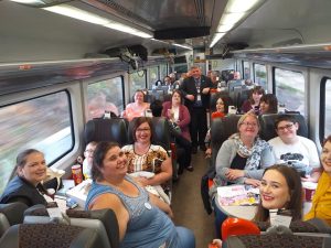 Photo of Herstory group on train to London
