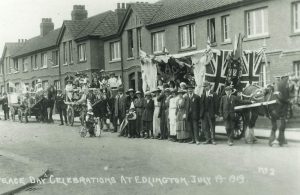 black and white photograph of a street parade