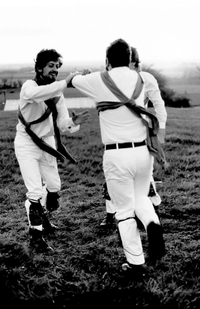 three morris men dancing