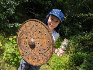 Young child with shield replica