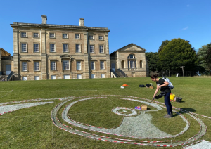 Artist making land art at Cusworth Hall